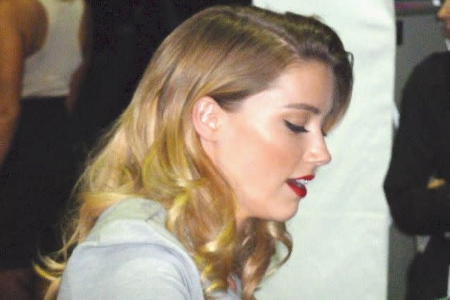 Amber Heard photographed from the side