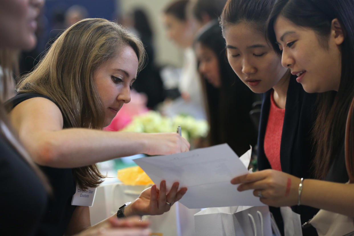 Potential employers meet with students at the Barnard College Career and Internship Fair in New York City. (Photo by John Moore/Getty Images)