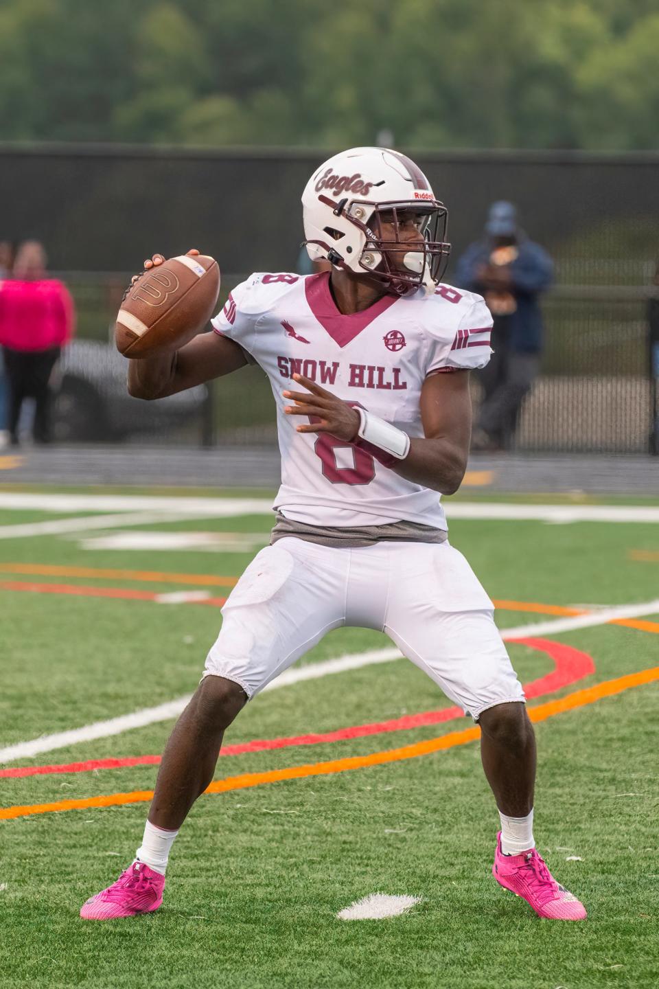 Snow Hill quarterback Zyheem Collick throws a pass in the 2nd quarter of their match up against Stephen Decatur Friday night in Berlin.