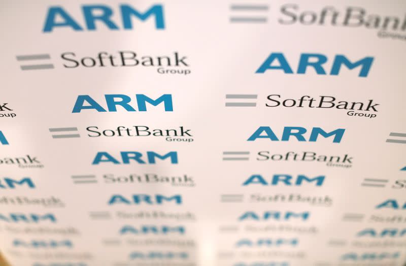 FILE PHOTO: An ARM and SoftBank Group branded board is displayed at a news conference in London