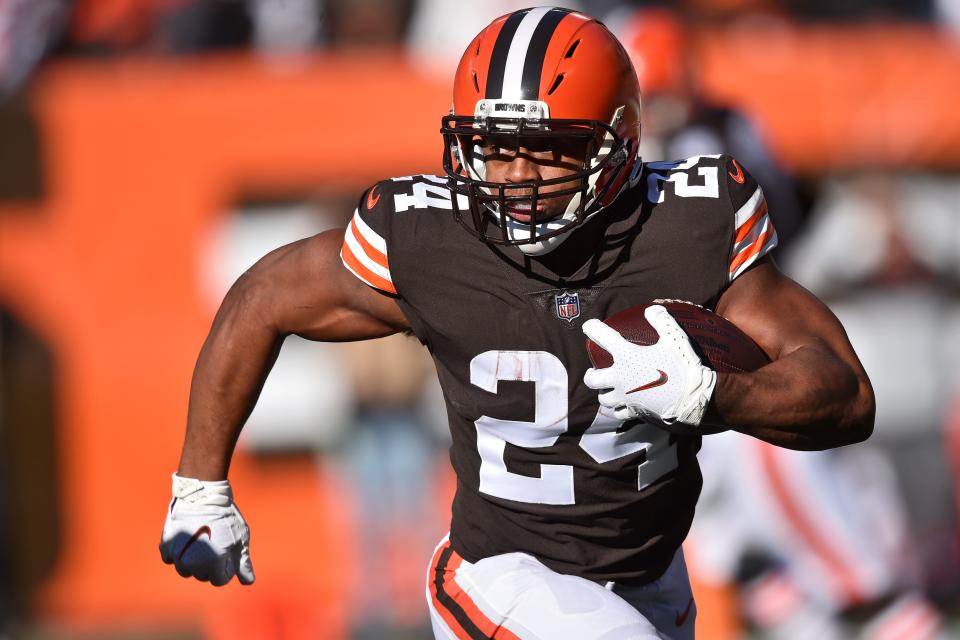 Cleveland Browns running back Nick Chubb runs during the first half of an NFL football game against the Baltimore Ravens, Sunday, Dec. 12, 2021, in Cleveland. (AP Photo/David Richard)