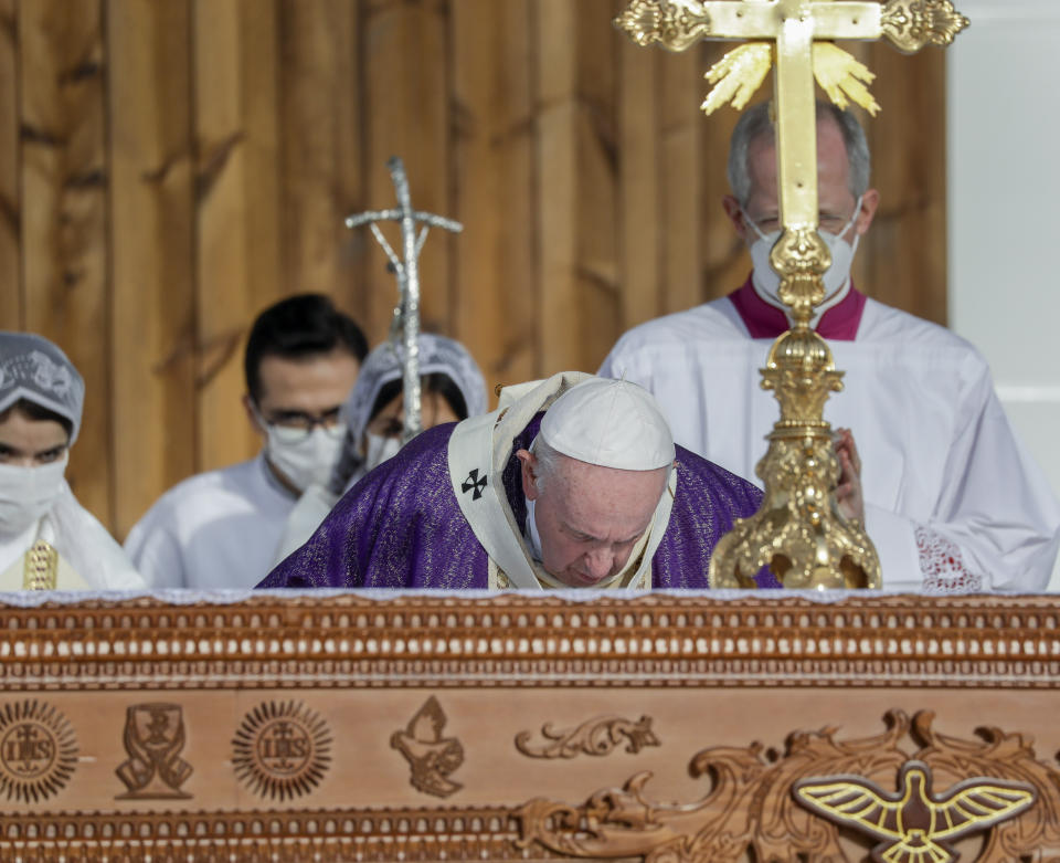 Pope Francis celebrates mass at the Franso Hariri Stadium in Irbil, Kurdistan Region of Iraq, Sunday, March 7, 2021. The Vatican and the pope have frequently insisted on the need to preserve Iraq's ancient Christian communities and create the security, economic and social conditions for those who have left to return.(AP Photo/Andrew Medichini)