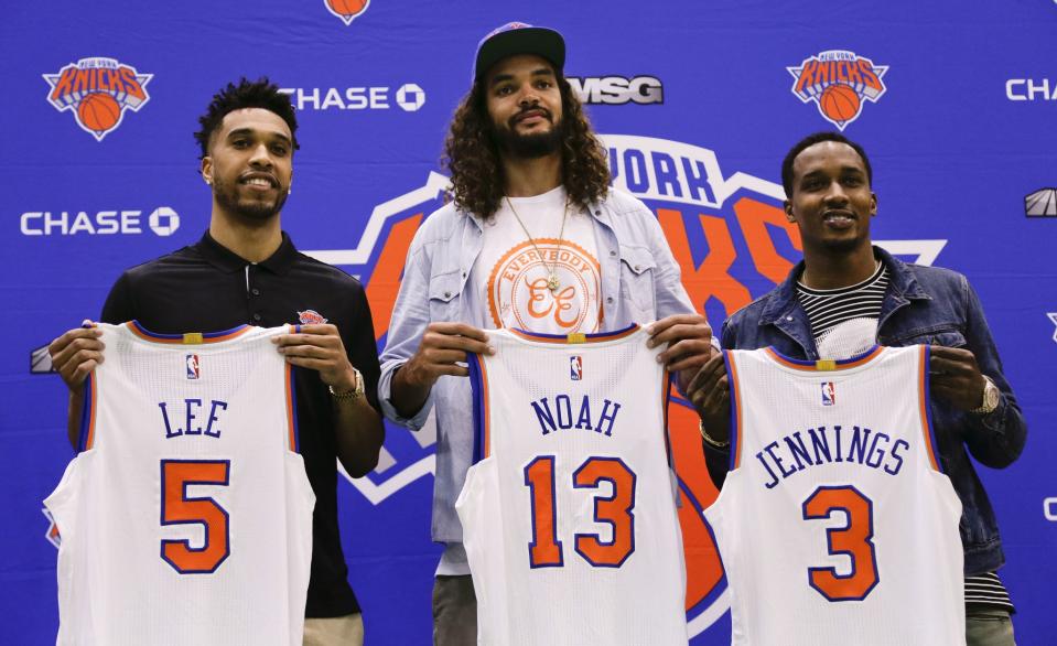 Courtney Lee (left) Joakim Noah (center) and Brandon Jennings will be counted on to lift the Knicks back to the playoffs. (AP)