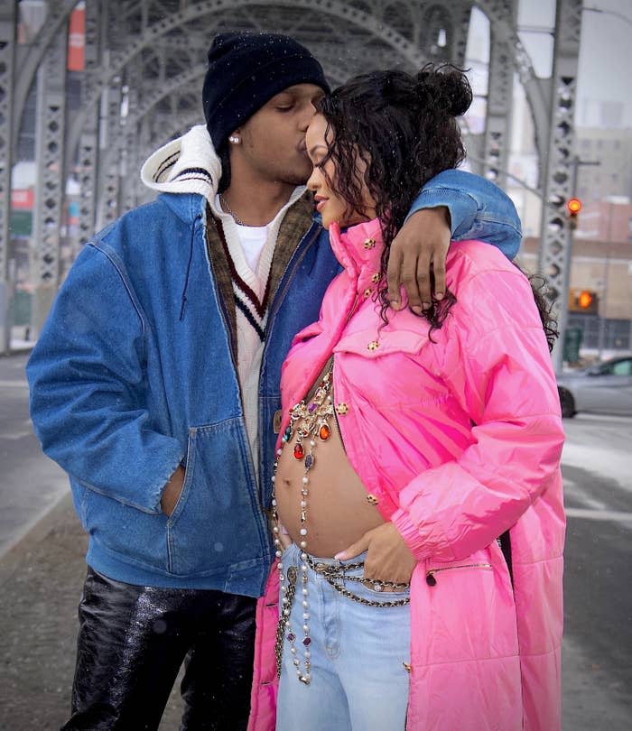 A$AP Rocky kissing Rihanna's forehead as she shows off her growing baby bump
