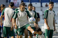 Andres Guardado plays a ball during Mexico official training on the eve of the group C World Cup soccer match between Saudi Arabia and Mexico, in Jor , Qatar, Tuesday, Nov. 29, 2022. (AP Photo/Moises Castillo)