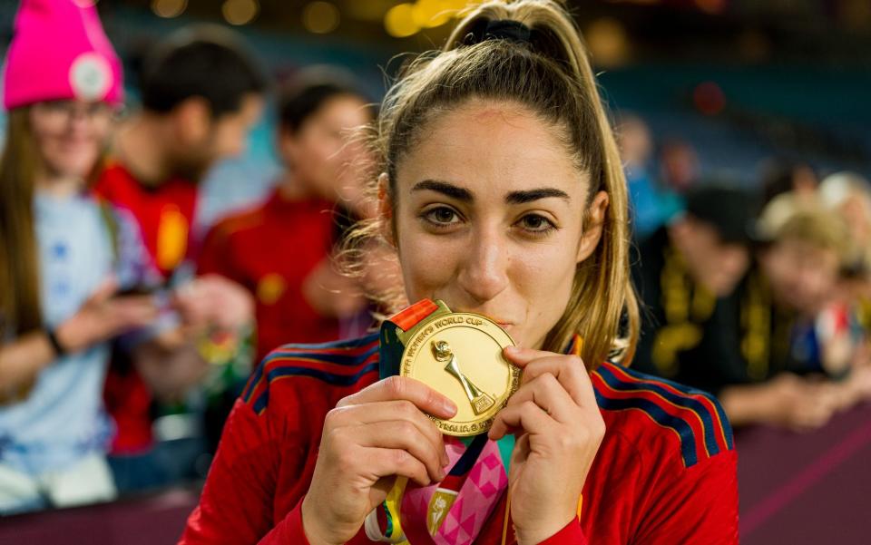 Olga Carmona of Spain kisses the First Place Medal after her team's victory in the FIFA Women's World Cup Australia & New Zealand 2023 Final match between Spain and England at Stadium Australia on August 20, 2023 in Sydney, Australia