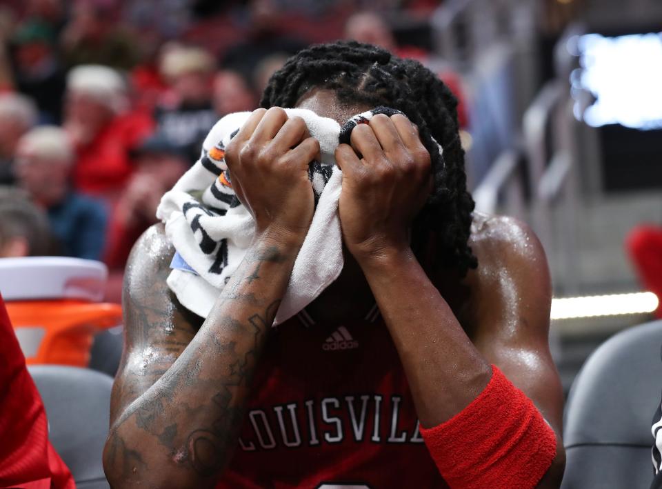 Louisville's Mike James held his head in his hands during the closing seconds of the Cardinals' loss to Boston College on Saturday night.