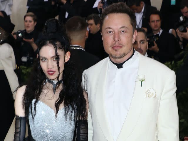 <p>Taylor Hill/Getty</p> Grimes and Elon Musk at the 2018 MET Gala.