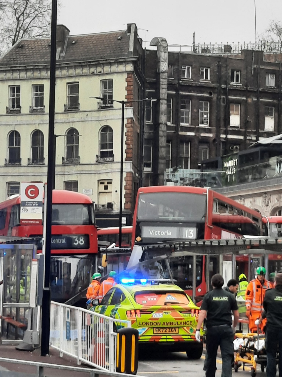 The number 13 bus seemed to smash into the bus stop (Twitter/roymundo)