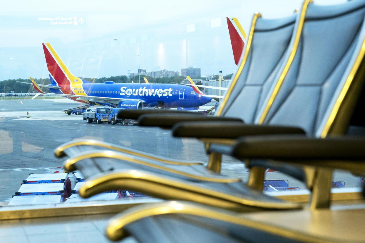 A Southwest Airlines plane remains at the gate at Ronald Reagan National Airport in Arlington, Va., on May 25, 2021. (Stefani Reynolds / Bloomberg via Getty Images file)