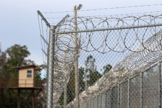 Barb wire, razor ribbon, watch tower, Stone County Regional Correctional Facility in Wiggins on Thursday, Nov. 17, 2022.