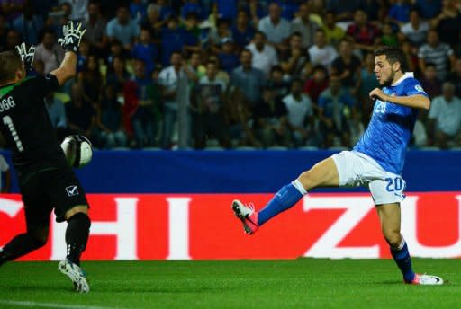 Italy's Forward Mattia Destro (R) scores during the FIFA 2014 World Cup Qualifier football match against Malta in Modena, at the freglia stadium. Italy won 2-0