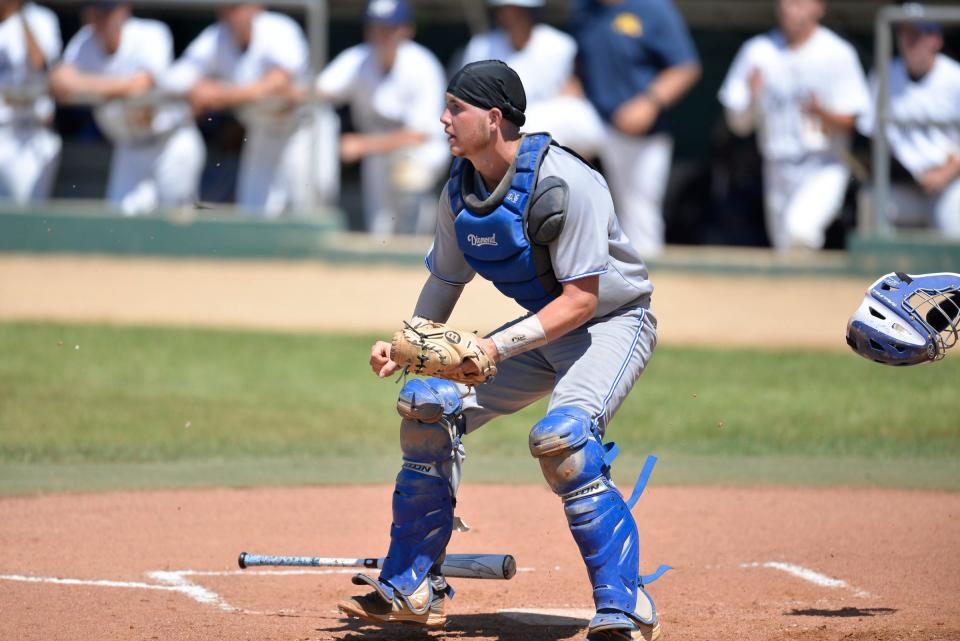 Sartell's Jack Greenlun covers home plate on a play against Mahtomedi during the Class AAA state semifinals at the Mini Met in Jordan on Wednesday, June 16, 2021.