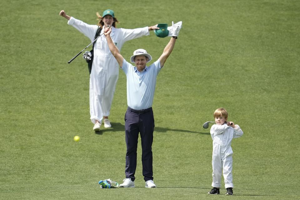 Peter Malnati and his wife Alicia react as their son Hatcher hits on on the fifth hole during the par-3 contest at the Masters golf tournament at Augusta National Golf Club, Wednesday, April 10, 2024, in Augusta, Ga. (AP Photo/George Walker IV)