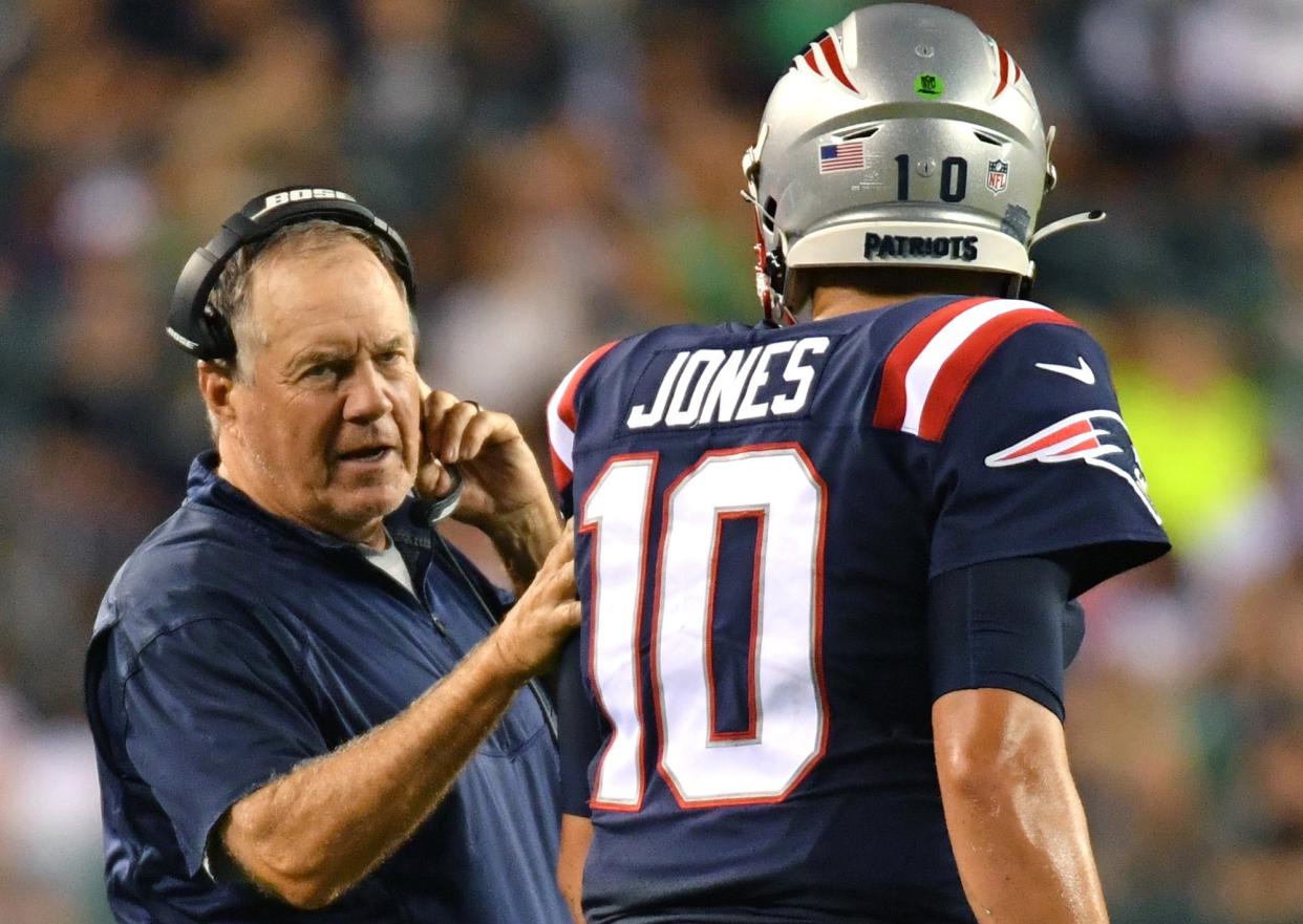 Aug 19, 2021; Philadelphia, Pennsylvania, USA;  New England Patriots head coach Bill Belichick with quarterback Mac Jones (10) against the Philadelphia Eagles at Lincoln Financial Field. Mandatory Credit: Eric Hartline-USA TODAY Sports - 16641417