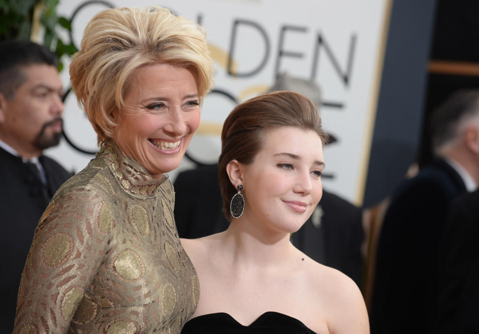 Emma Thompson, left, and Gaia Romilly Wise arrive at the 71st annual Golden Globe Awards at the Beverly Hilton Hotel on Sunday, Jan. 12, 2014, in Beverly Hills, Calif. (Photo by Jordan Strauss/Invision/AP)