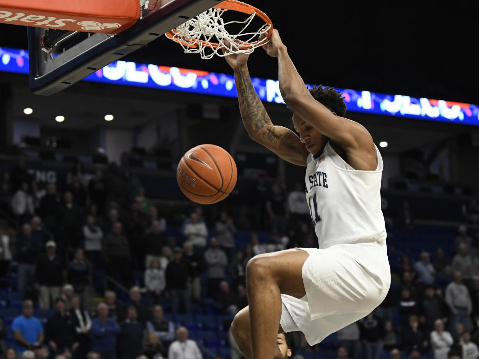 Penn State's Lamar Stevens (11) scores during the first half of an NCAA college basketball game against Central Connecticut State, Friday, Dec. 20, 2019, in State College, Pa. (AP Photo/John Beale)