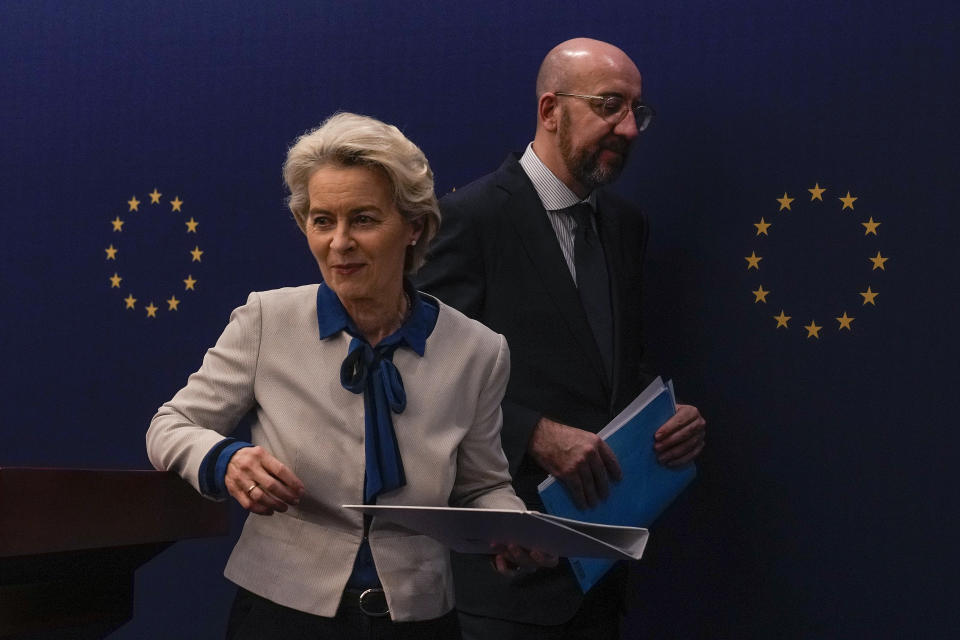 European Commission President Ursula von der Leyen, left, and European Council President Charles Michel leave the stage after a press conference at the European Union Delegation to China compound in Beijing, Thursday, Dec. 7, 2023. (AP Photo/Andy Wong)