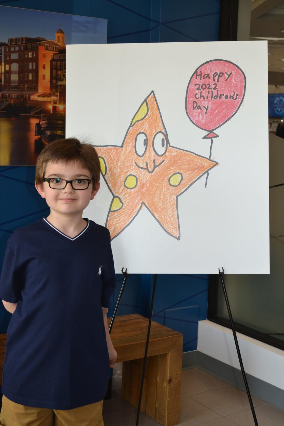 Aidan Dargenio, 10, of Rye, is the winner of the 2022 Children's Day logo contest. His winning design will appear on marketing and merchandising items for this year's festival.