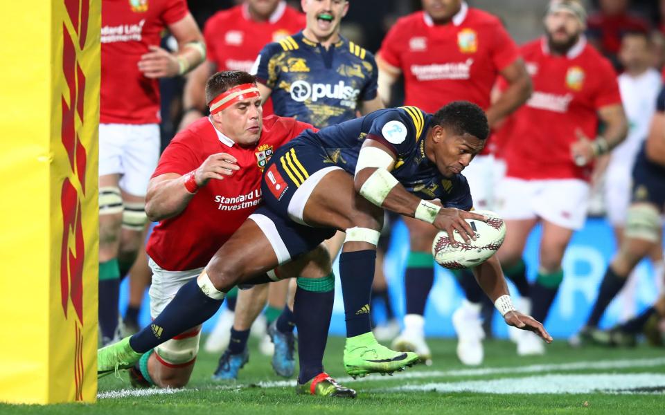 Waisake Naholo of the Highlanders barges through CJ Stander of the Lions to score the opening try during the 2017 British & Irish Lions tour match between the Highlanders and the British & Irish Lions at the Forsyth Barr Stadium on June 13, 2017 in Dunedin, New Zealand - Credit: Getty Images