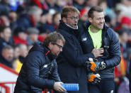 Football Soccer Britain - AFC Bournemouth v Liverpool - Premier League - Vitality Stadium - 4/12/16 Liverpool manager Juergen Klopp and Simon Mignolet Reuters / Eddie Keogh Livepic EDITORIAL USE ONLY. No use with unauthorized audio, video, data, fixture lists, club/league logos or "live" services. Online in-match use limited to 45 images, no video emulation. No use in betting, games or single club/league/player publications. Please contact your account representative for further details.