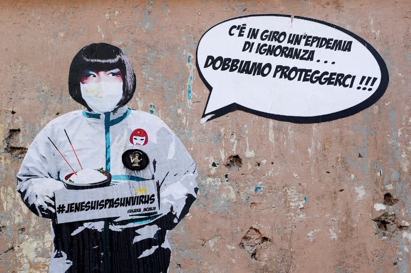 Mural against xenophobia towards Chinese people is seen after two cases of the novel coronavirus were confirmed in Italy