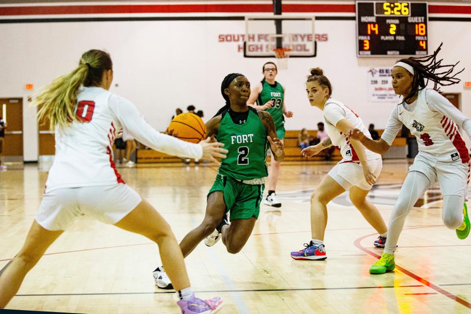 Jadah Toombs of tFort Myers drives to the basket against South Fort Myers during a playoff game against South Fort Myers. Fort Myers won.  