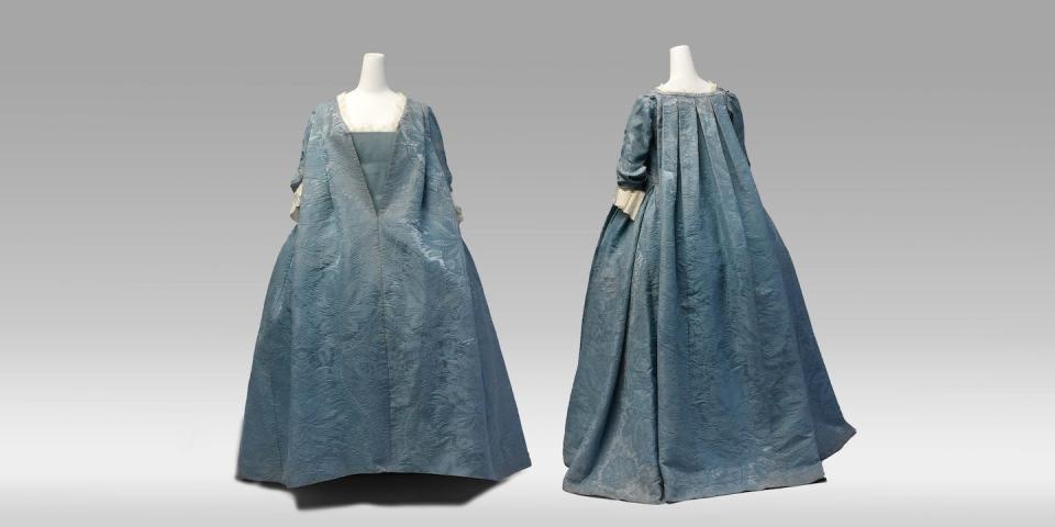 This loose 1730s style was called a <em>robe volante</em>. <a href="https://www.metmuseum.org/art/collection/search/155093" rel="nofollow noopener" target="_blank" data-ylk="slk:The Met/Purchase, Friends of The Costume Institute Gifts, 2010;elm:context_link;itc:0;sec:content-canvas" class="link ">The Met/Purchase, Friends of The Costume Institute Gifts, 2010</a>