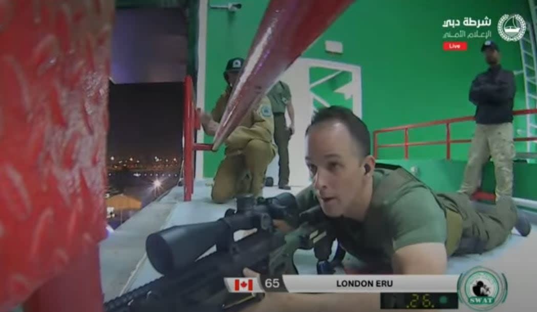 A London police officer competes during a shooting exercise as part of the UAE SWAT Challenge which took place this week in Dubai. London was the only Canadian police force to send a team. (YouTube - image credit)