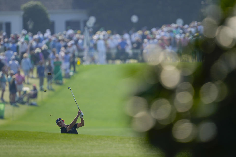 Patrick Cantlay hits from the fairway on the first hole during a practice round for the Masters golf tournament at Augusta National Golf Club on Wednesday, April 5, 2023, in Augusta, Ga. (AP Photo/Matt Slocum)