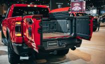 <p>The Ram takes a different approach than <a rel="nofollow noopener" href="https://www.caranddriver.com/news/a19056678/here-are-all-six-things-the-2019-gmc-sierras-wild-multipro-tailgate-can-do/" target="_blank" data-ylk="slk:the GMC;elm:context_link;itc:0;sec:content-canvas" class="link ">the GMC</a>, splitting the tailgate horizontally into hinged 60/40 sections that can swing out, clamshell style, when the tailgate is raised.</p>