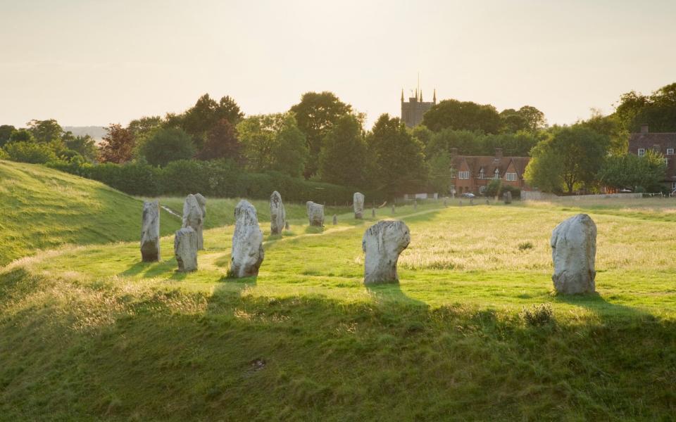 The sleepy village of Avebury is encircled by Neolithic henges  - Getty