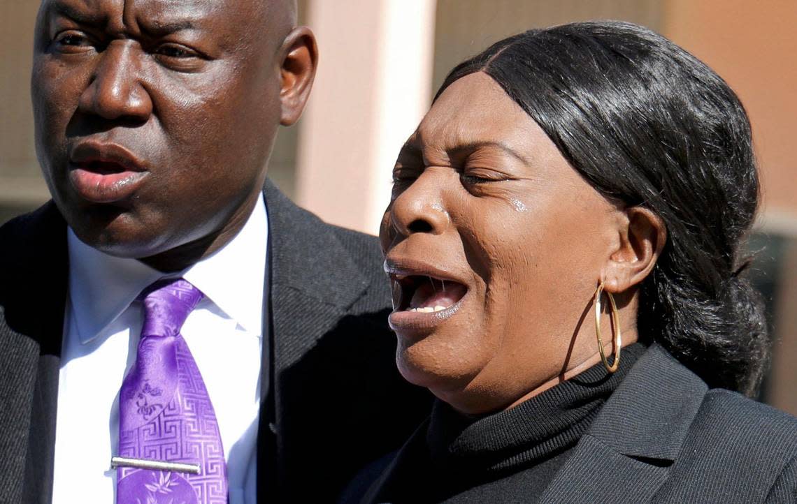 Kodak Black’s mother, Marcelene Simmons, right, makes an emotional pleas for her son’s safety as Civil Rights attorney Benjamin Crump, left, held a press conference across from the Miami Federal Detention Center where his client rapper Kodak Black was removed after allegations of abuse on Wednesday, Jan. 22, 2020.