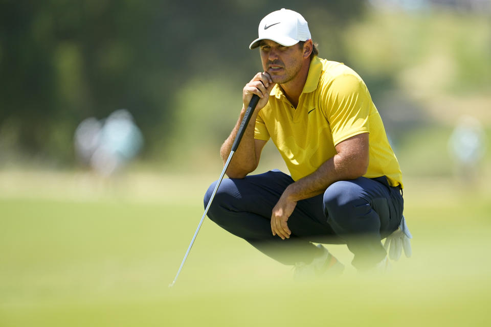 Brooks Koepka lines up a putt on the seventh hole during the third round of the U.S. Open golf tournament at Los Angeles Country Club on Saturday, June 17, 2023, in Los Angeles. (AP Photo/Matt York)