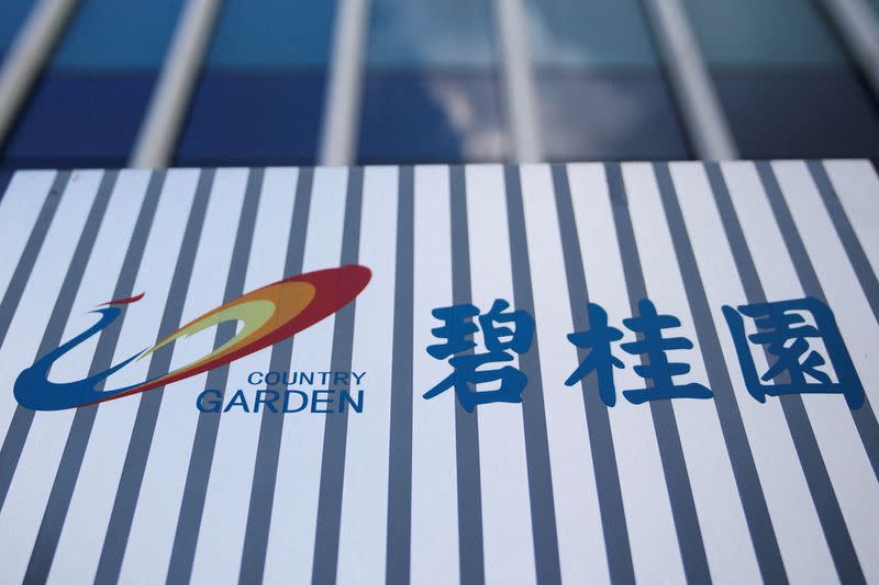 FILE PHOTO: The company logo of Chinese developer Country Garden is pictured at the Shanghai Country Garden Center in Shanghai