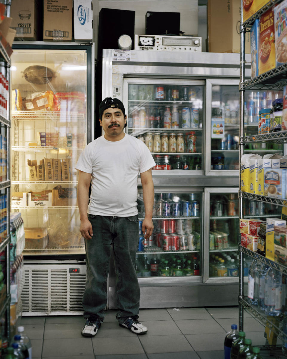 Pedro Guillermo Curiel stands inside the SoHo Mini Market in&nbsp;New York City. He told&nbsp;Mu&ntilde;oz Boullosa:&nbsp;<br /><br />"I am Guillermo&hellip; well, Pedro Guillermo. I have two names. I have worked in the deli for 11 years. I take the sandwich orders. My favorite thing happening in New York City are the soccer matches. I used to play in Flushing, but not anymore. Now I don&rsquo;t have time, I always finish working until very late at night."