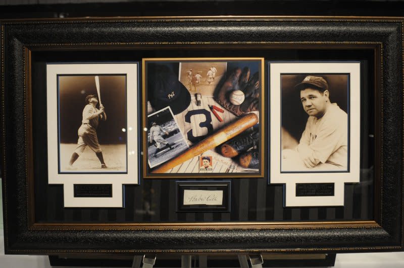 A set of framed photos of Babe Ruth is up for auction at the Taste of the NFL on the eve of Super Bowl XLII on February 2, 2008. On August 16, 1948, Ruth died in New York of cancer at age 53. File Photo by Roger L. Wollenberg/UPI