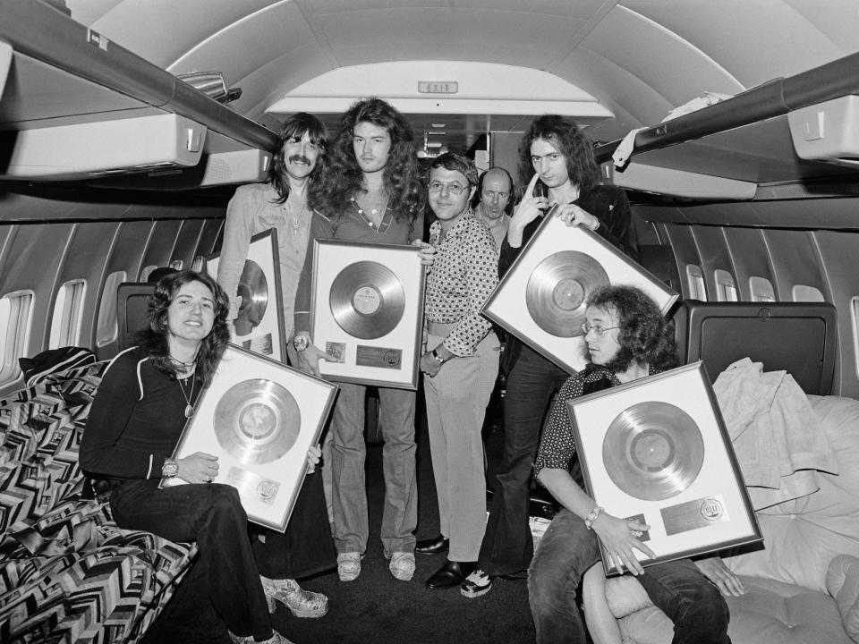 Deep Purple poses with gold discs onboard the Starship in 1974.