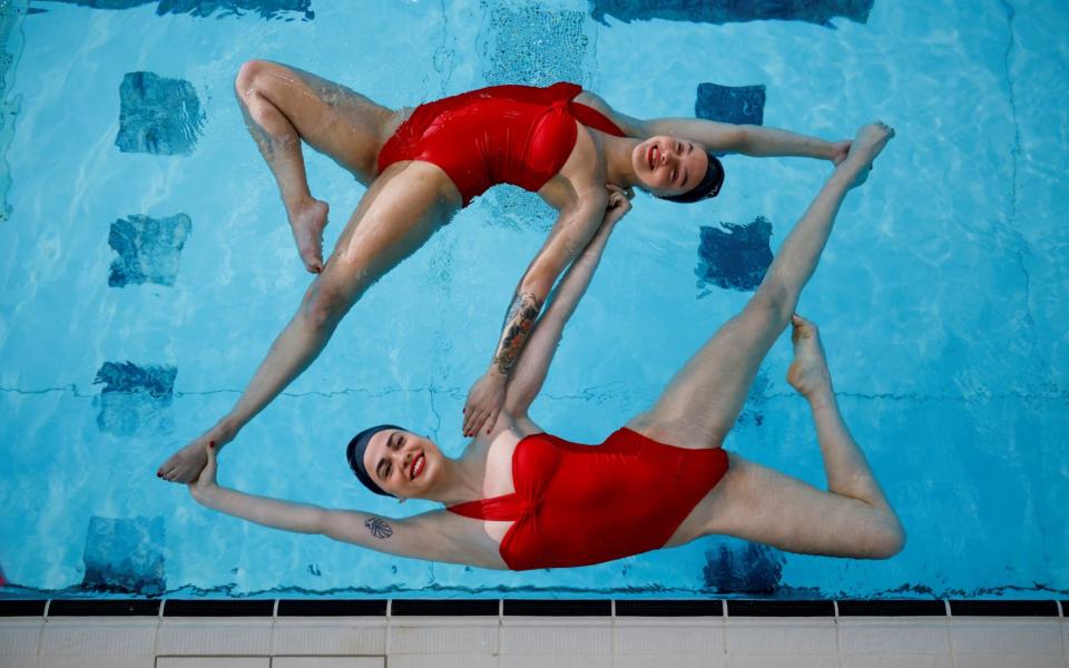 Synchronised swimmers from Aquabatix resume training at Clissold Leisure Centre, in London -  JOHN SIBLEY / REUTERS