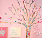 <div class="caption-credit"> Photo by: Project Nursery</div><b>When in Doubt, Add Glue <br></b> You don't have to be a muralist to open a jar of Modge Podge and tear scrapbook paper for some serious artistic impact. This is a good way to customize the easy-to-apply stick-on wall hangings you can find at any Target or local craft store.