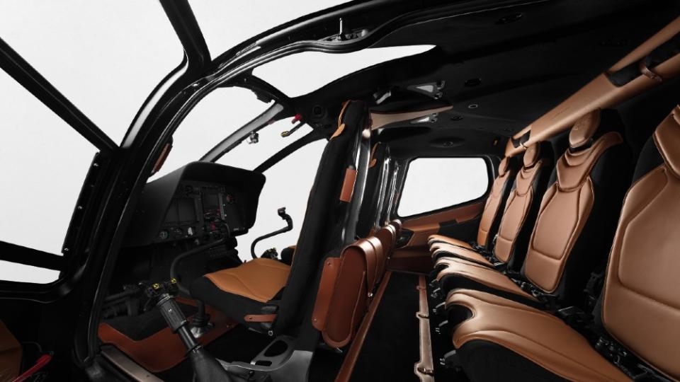 The executive helicopter was configured with a sportscar style, with forward-facing seats and large windows. The Aston Martin version has seats and doors upholstered in supple leather, reminiscent of the DB11. - Credit: Courtesy ACH