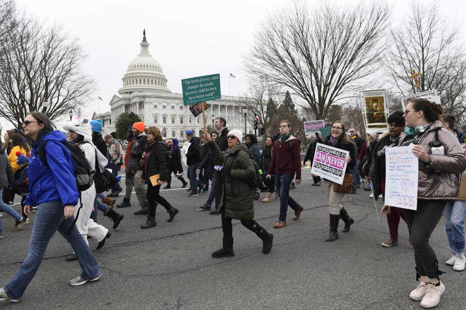 FILE - In this Jan. 24, 2020, file photo, anti-abortion activists participate in the "March for Life" rally near Capitol Hill in Washington. Anti-abortion leaders across America were elated a year ago when Donald Trump became the first sitting U.S. president to appear in person at their highest-profile annual event, the March for Life held every January. The mood is more sober now — a mix of disappointment over Trump’s defeat and hope that his legacy of judicial appointments will lead to future court victories limiting abortion rights. (AP Photo/Susan Walsh, File)