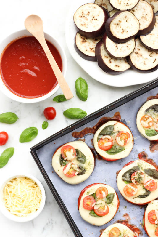 <p>Dish by Dish</p><p>A fuss-free, super simple recipe for mini caprese eggplant pizzas. I’m talking about a meal that can be whipped up in less than 30 minutes – and is tasty and delicious too.</p><p><strong>Get the recipe: <a href="https://www.dishbydish.net/mini-caprese-eggplant-pizzas/" rel="nofollow noopener" target="_blank" data-ylk="slk:Mini Caprese Eggplant Pizzas;elm:context_link;itc:0;sec:content-canvas" class="link rapid-noclick-resp"><em>Mini Caprese Eggplant Pizzas</em></a></strong></p>