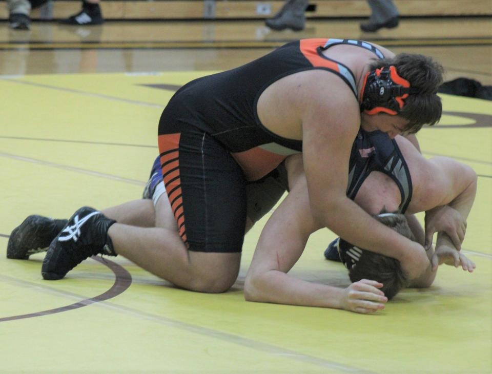 Cheboygan senior Devihn Wichlacz (left) takes control against his Sault opponent during a 275-pound bout in a Straits Area Conference wrestling clash against the Blue Devils in Pellston on Wednesday.