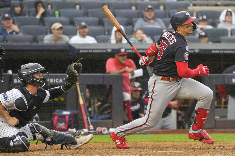 Washington Nationals' Joey Meneses follows through after hitting an hits an RBI single in the ninth inning of a baseball game, Thursday, Aug. 24, 2023, in New York. The Nationals won 6-5. (AP Photo/Mary Altaffer)