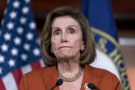 FILE - Speaker of the House Nancy Pelosi, D-Calif., reacts to the Supreme Court decision overturning Roe v. Wade, during a news conference at the Capitol in Washington, June 24, 2022. Pelosi warned that Republicans would be called to answer for their work and were planning even more draconian measures if they win control of Congress, including a nationwide ban on abortion. (AP Photo/J. Scott Applewhite, File)