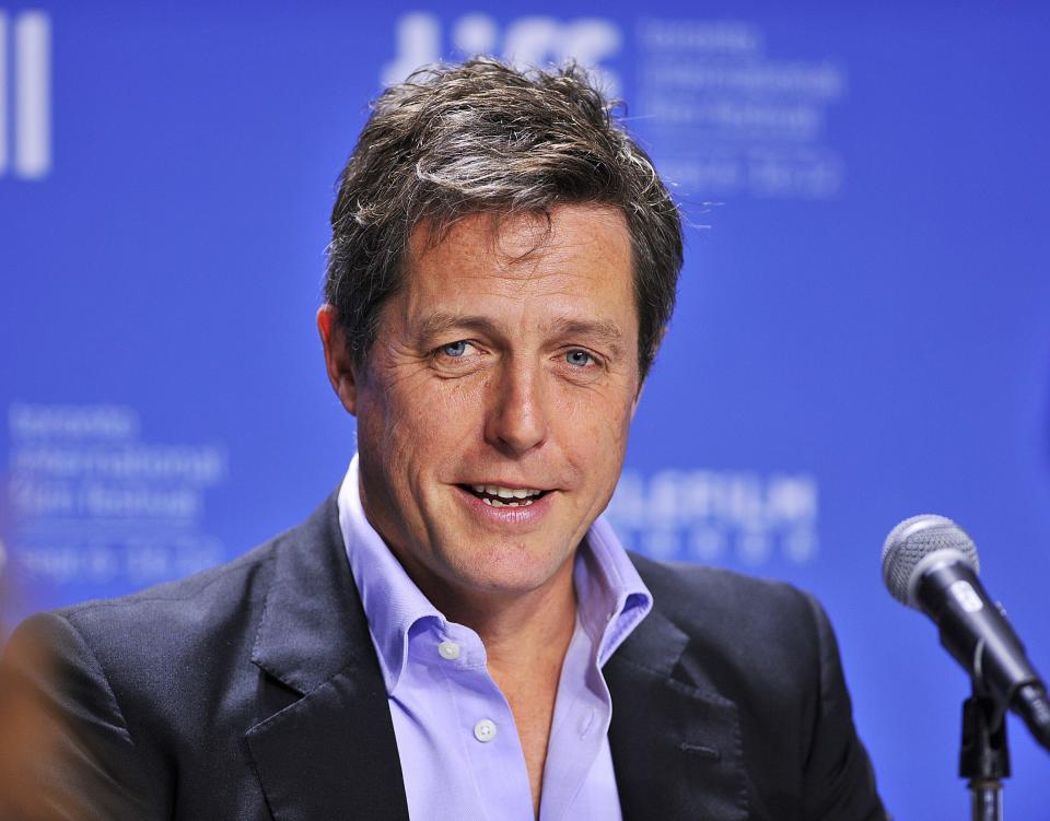 FILE - In this Sept. 9, 2012 file photo, actor Hugh Grant speaks during the news conference for the film "Cloud Atlas" during the 2012 Toronto International Film Festival in Toronto. Lord Justice Brian Leveson will release his report, Thursday, Nov. 29 2012, on a year-long inquiry into the culture and practices of the British press and his recommendations for future regulation to prevent phone hacking, data theft, bribery and other abuses. (AP Photo/The Canadian Press, Aaron Vincent Elkaim, File)