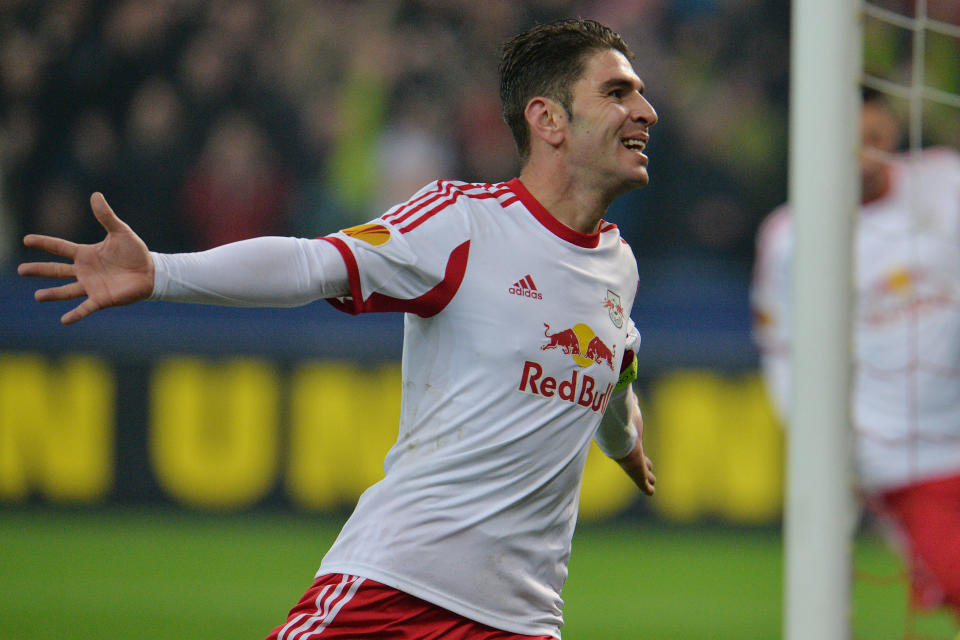 Salzburg's Jonatan Soriano celebrates after scoring during the Europa League round of 32 second leg soccer match between Red Bull Salzburg and Ajax in Salzburg, Austria, on Thursday, Feb. 27. 2014. (AP Photo/Kerstin Joensson)