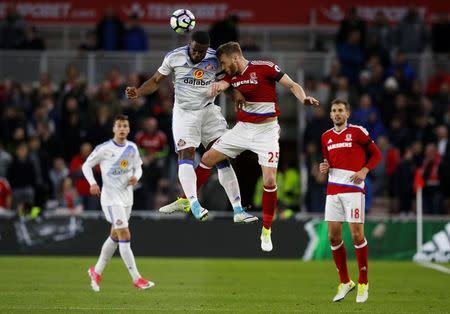 Britain Soccer Football - Middlesbrough v Sunderland - Premier League - The Riverside Stadium - 26/4/17 Sunderland's Victor Anichebe and Middlesbrough's Calum Chambers challenge for the ball in the air Reuters / Phil Noble Livepic