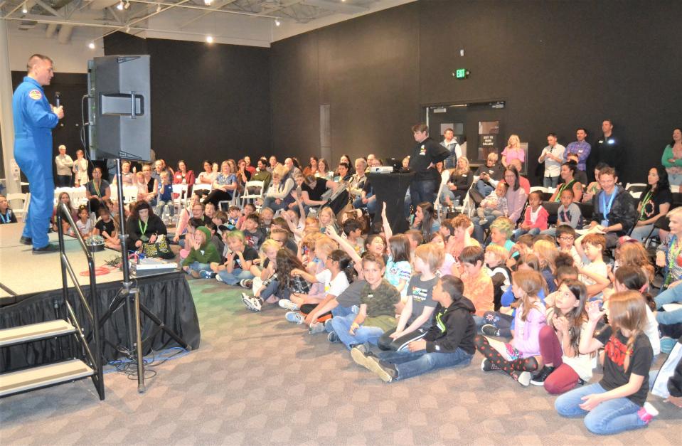 Astronaut Kjell Lindgren speaks to Laurel Elementary School second-graders and other community members about his time in space on Thursday at the Fort Collins Museum of Discovery.